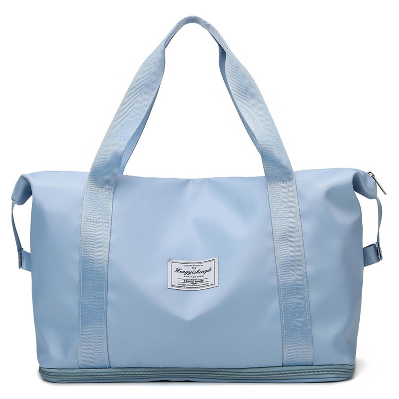Blue expandable gym tote with wet pocket