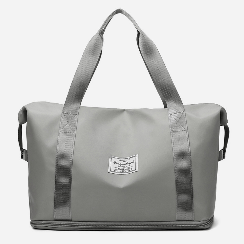 Grey expandable gym tote with wet pocket