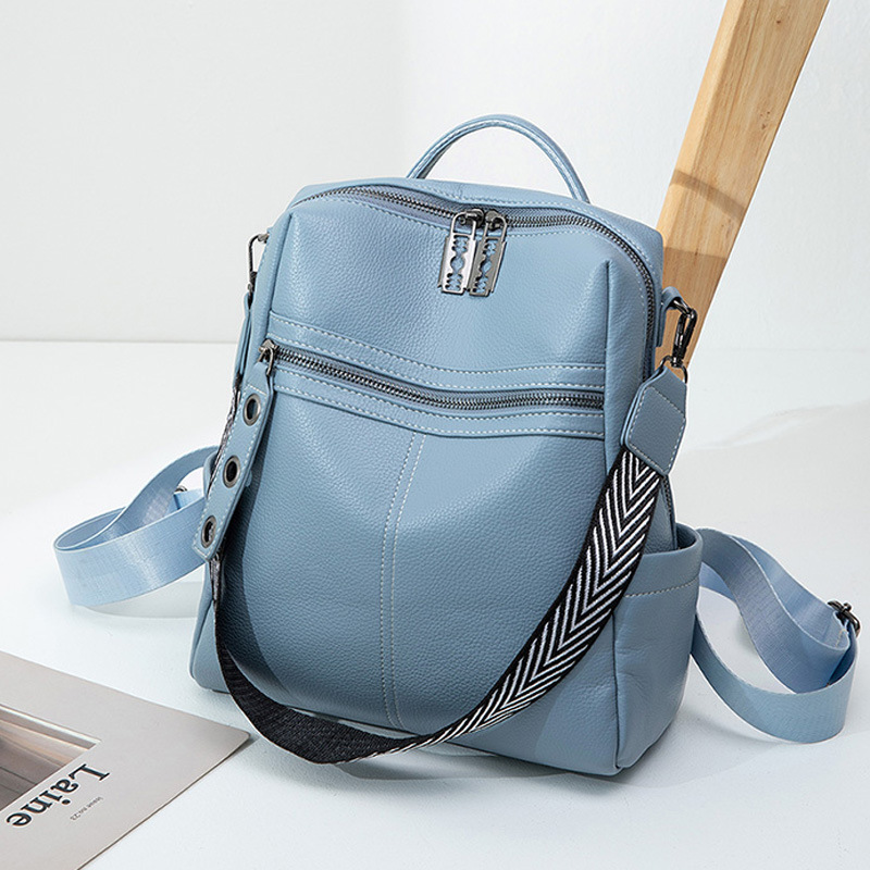 Blue compact faux leather backpack